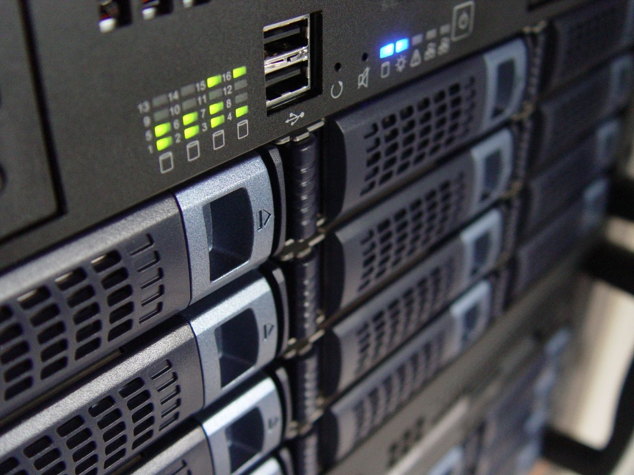 Rack-mounted business servers with active status lights, set up and managed by Netbus
